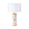 A stylish white and gold table lamps with bug details