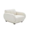 Luxurious white boucle fabric armchair with deep seating and black legs