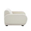 Luxurious white boucle fabric armchair with deep seating and black legs