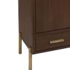 Elegant dark brown wood cabinet with ribbed brass handles and feet