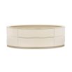 Dreamy oval-shaped coffee table with two drawers for storage and a mirrored surface 