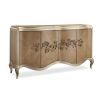 A luxurious champagne-coloured sideboard with interior shelving and drawers