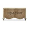 A luxurious champagne-coloured sideboard with interior shelving and drawers