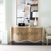 A luxurious champagne-coloured sideboard with interior shelving and drawers