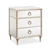 A luxury bedside table with a mirrored design, white marble top and glamorous gold detailing