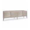 A sophisticated entertainment unit by Caracole with a curved design and elegant feet