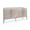 A luxury sideboard by Caracole with Art-Deco inspired inlay and a champagne finish