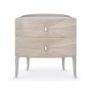 An elegant bedside table with a chic and curvaceous design 