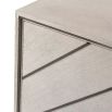 Alluring, modern cabinet with geometric inlay and stepped base