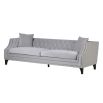 luxurious grey velvet sofa with silver studding and black legs