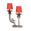 Tropical inspired table lamp, with a small monkey on a palm tree and two orange shades