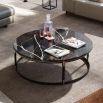 A luxurious black marble coffee table with golden embellishments 