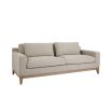 A luxurious modern cosy sofa with beige upholstery  