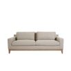 A luxurious modern cosy sofa with beige upholstery  