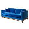 Art deco inspired, traditional style sofa with a brass base and dark wooden plinth in blue velvet