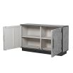 grey and black distressed sideboard with circular patterns