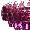 Vibrant pink chandelier composed of intricate fragments of delicate glass