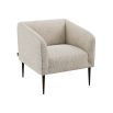 An elegant square shape armchair with sumptuous upholstery