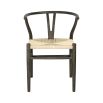 A Scandinavian-style dark brown ash wood and paper twine dining chair 