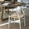 Curved open back, scandi-inspired dining chair in white