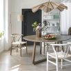 Curved open back, scandi-inspired dining chair in white