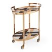 The Chambeige Bar Cart features back-painted glass shelves in a captivating Chambeige hue, framed by polished brass for a glamorous touch.