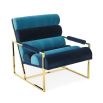 A glamorous two-toned blue velvet lounge chair 