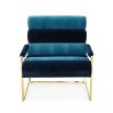 A glamorous two-toned blue velvet lounge chair 