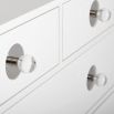 A glamorous Hollywood-inspired six drawer chest with acrylic and nickel details