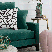 Green Velvet Upholstered Sofa with Solid Black Plinth