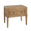 A stylish minimalist natural oak and plywood bedside table