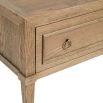 A stylish minimalist natural oak and plywood bedside table