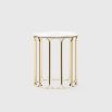 A luxurious modern side table with a golden base and marble tabletop
