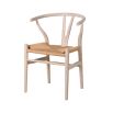 A sophisticated, Scandinavian-style chair with an open back design and natural finish