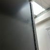 Sticker residue and slight scratching on side of chest