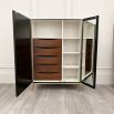 Luxury brown Caracole chest with champagne finish and abundance of storage