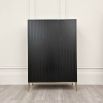 Luxury brown Caracole chest with champagne finish and abundance of storage