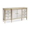 A contemporary cabinet by Caracole with a mirrored design and champagne finish