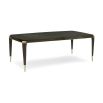 A luxury extendable dining table by Caracole with glamorous gold details