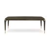 A luxury extendable dining table by Caracole with glamorous gold details