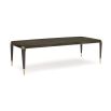 A luxury extendable dining table by Caracole with glamorous gold details