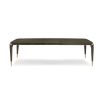 A luxury extendable dining table by Caracole with glamorous gold details
