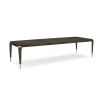 A luxury extendable dining table by Caracole with glamorous gold details