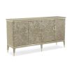 A beautiful sideboard by Caracole with fabulous floral embellishments and gold finished detailing