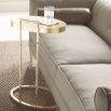 Delicate and glamorous side table with gold, bamboo effect frame