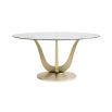 Divine dining table with champagne coloured tulip base with glass top