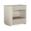 Dreamy bedside table with ribbing details, featuring two drawers and a shelf