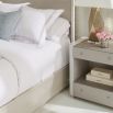 Dreamy bedside table with ribbing details, featuring two drawers and a shelf