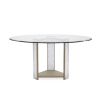 Glamorous round dining table with a glass top and divine crystal-like legs and brass accents