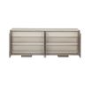 A sophisticated sideboard by Caracole with veneer patterning and a cream stone top